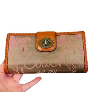 Coach signature Turnlock Wallet  with Horse & carriage design pink and beige